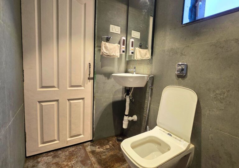 Vandana Villa, Alibag: Attached bathroom with a washbasin