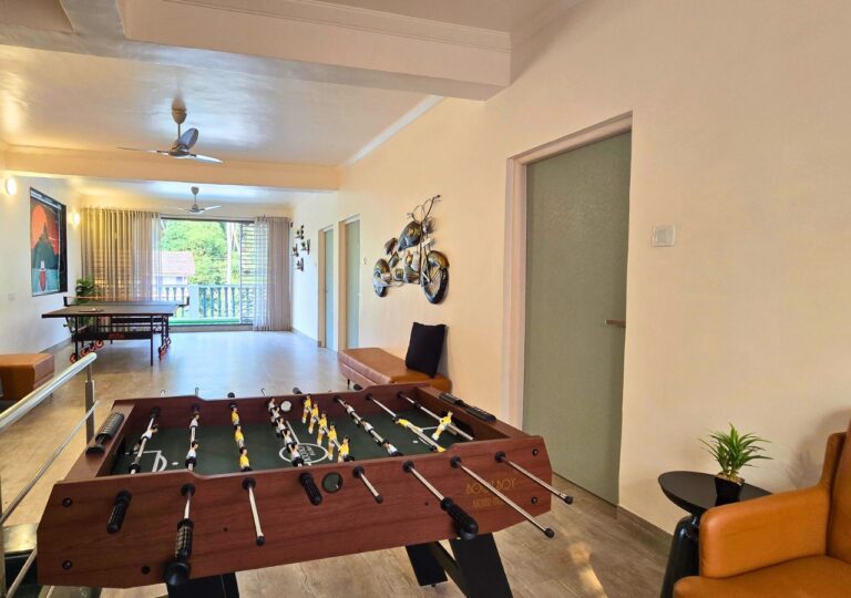 Vandana Villa, Alibag: Foosball table, with table tennis beyond