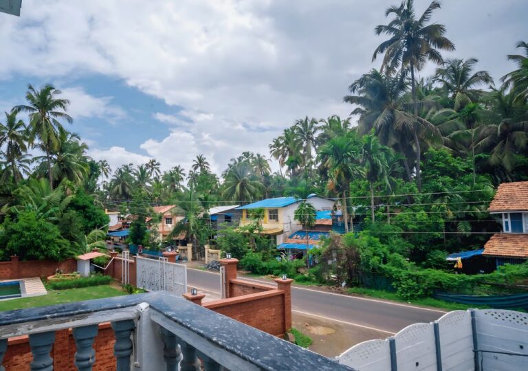 Vandana Villa, Alibag: View from the balcony over the gate and the lane